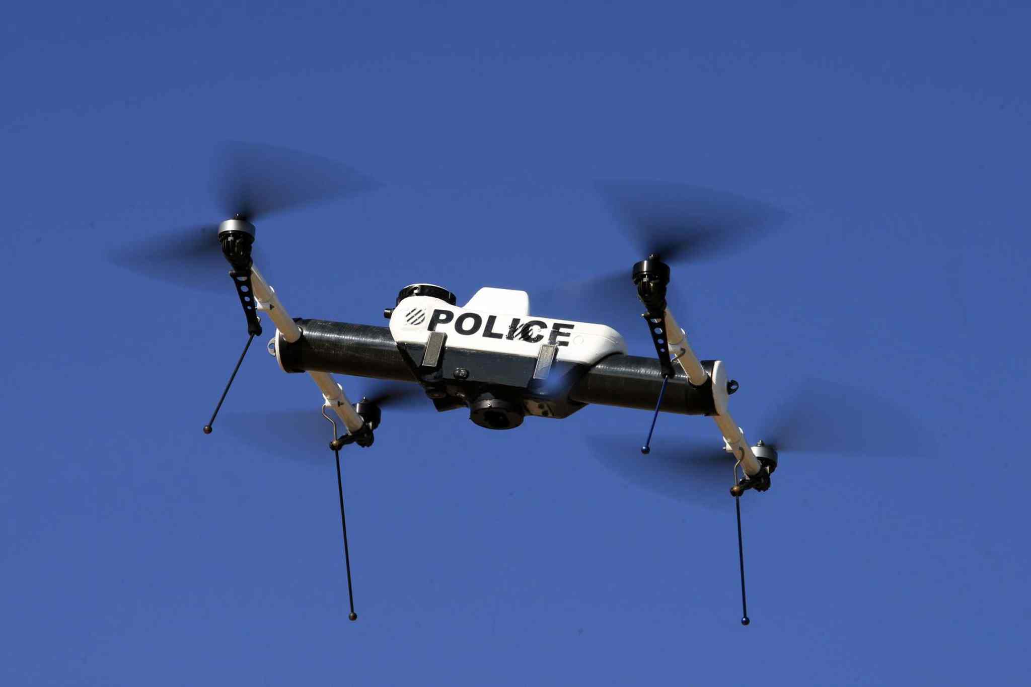 The Qube is flown in a demonstration in Simi Valley, California, October 19, 2011. The tiny drone with four whirling rotors swoops back and forth about 200 feet above the ground scouring the landscape and capturing crystal-clear video of what lies below. (Gary Friedman/Los Angeles Times/MCT)